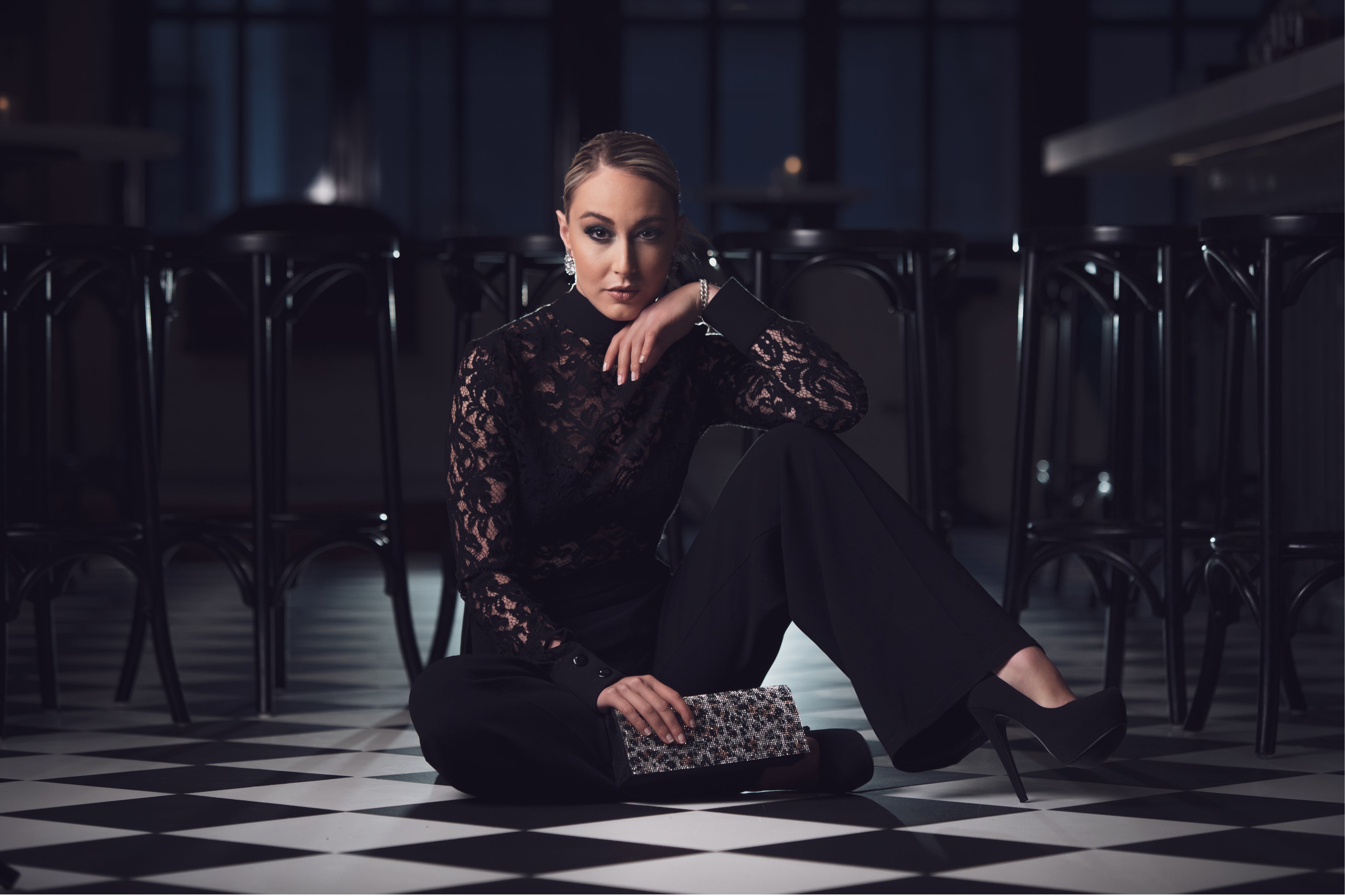 Willow stuns in Gidi's classic luxurious Black Bow Collar Blouse and fitted Black Pant. Perfect for every shape woman